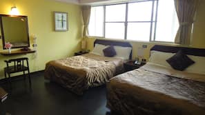 Desk, blackout drapes, rollaway beds, free WiFi