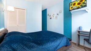 Soundproofing, iron/ironing board, free cribs/infant beds, rollaway beds