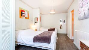Soundproofing, iron/ironing board, free cribs/infant beds, rollaway beds