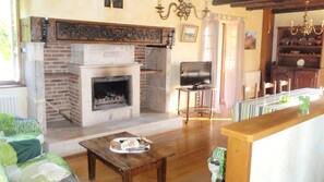 Flat-screen TV, fireplace