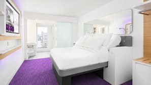 Luxe beddengoed, traagschuim, een kluis op de kamer, een bureau