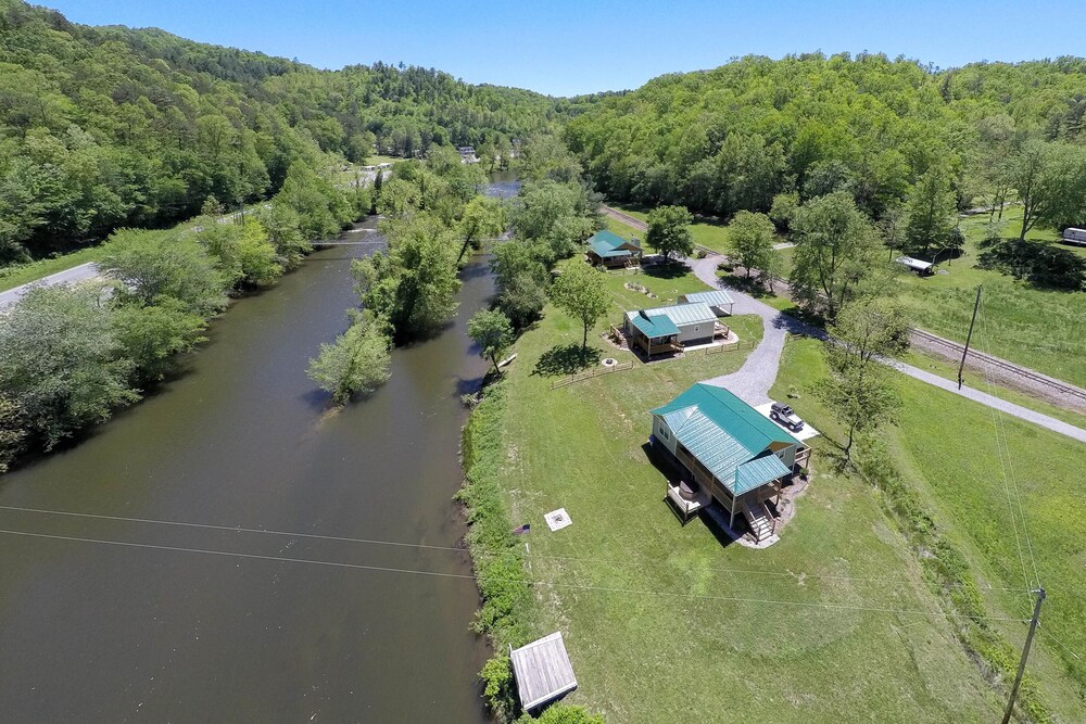 Handicap accessible riverfront home - outdoor firepit & hot tub!