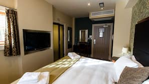 Select Comfort beds, desk, laptop workspace, iron/ironing board