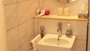 Hair dryer, towels, soap, toilet paper