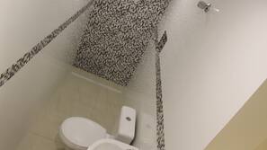 Blackout curtains, iron/ironing board, free WiFi, linens