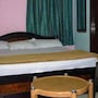 Iroomz HotelTanmai Residency in Vijayawāda, India