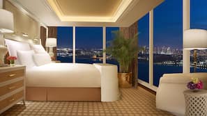 Premium bedding, down comforters, pillowtop beds, minibar