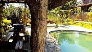 Outdoor pool, pool umbrellas, sun loungers