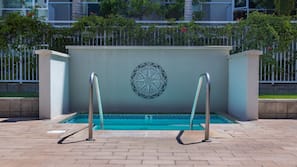 Outdoor pool, pool umbrellas, sun loungers