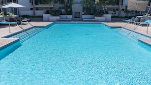 Outdoor pool, pool umbrellas, sun loungers