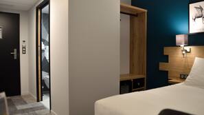Caja fuerte, sistema de insonorización, wifi gratis y ropa de cama