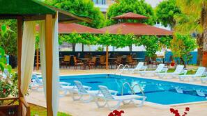 Seasonal outdoor pool, pool umbrellas, sun loungers