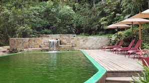 Outdoor pool, pool umbrellas, pool loungers