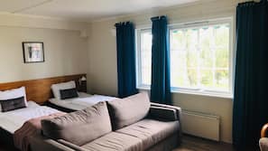 Desk, laptop workspace, free WiFi, linens