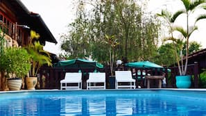 Outdoor pool, pool umbrellas, sun loungers