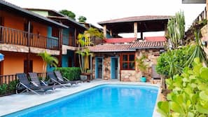 Outdoor pool, pool umbrellas, sun loungers