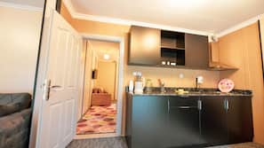 Fridge, hob, electric kettle, cookware/dishes/utensils