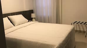 Escrivaninha, cortinas blackout, Wi-Fi de cortesia
