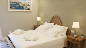 Premium bedding, down duvet, memory foam beds, in-room safe