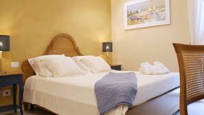 Premium bedding, down duvet, memory foam beds, in-room safe