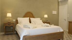 Premium bedding, down duvet, memory foam beds, in-room safe