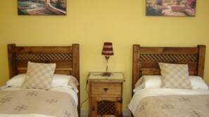 4 bedrooms, iron/ironing board, linens
