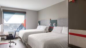Pillowtop beds, laptop workspace, blackout drapes, soundproofing