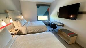 Pillowtop beds, laptop workspace, blackout drapes, soundproofing