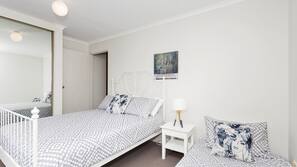 2 bedrooms, iron/ironing board, cribs/infant beds, linens
