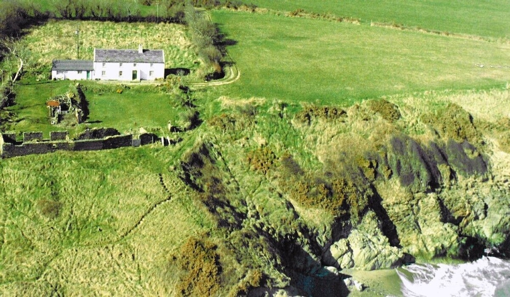 Breathtaking cliff top farmhouse with deserted beach Arklow Vrbo