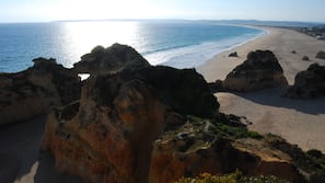 Beach nearby, white sand, 10 beach bars