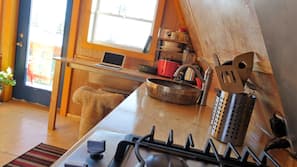 Fridge, stovetop, coffee/tea maker, cookware/dishes/utensils