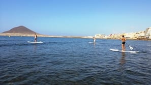 Beach nearby, beach umbrellas, beach towels, 15 beach bars