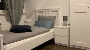 1 bedroom, desk, blackout drapes, iron/ironing board