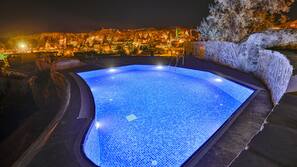 Seasonal outdoor pool, open 10:30 AM to 7:00 PM, pool umbrellas