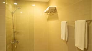 Shower, free toiletries, slippers, towels