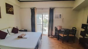 Laptop workspace, blackout drapes, linens