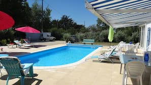 Seasonal outdoor pool, pool umbrellas, sun loungers