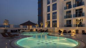 Outdoor pool, open 8:00 AM to 8:00 PM, pool umbrellas, pool loungers