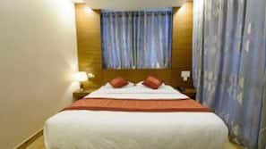 Blackout curtains, iron/ironing board, free WiFi, linens