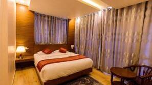 Blackout curtains, iron/ironing board, free WiFi, linens