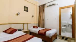 Blackout curtains, iron/ironing board, free WiFi, linens