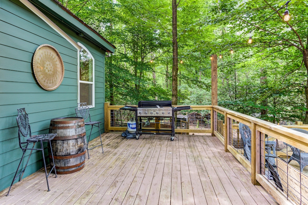 New listing! Creekside cabin w/open floor plan & multi-level decks! Dogs OK!