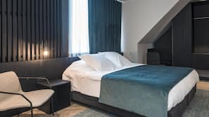 Donzen dekbedden, een minibar, een kluis op de kamer, een bureau