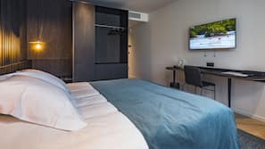 Donzen dekbedden, een minibar, een kluis op de kamer, een bureau