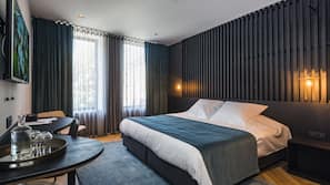 Donzen dekbedden, een minibar, een kluis op de kamer, een bureau