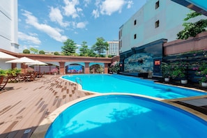 Seasonal outdoor pool, pool umbrellas, sun loungers