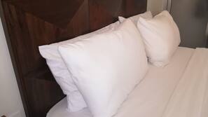 Ropa de cama de alta calidad y colchones con acolchado adicional
