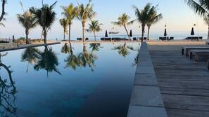 2 outdoor pools, pool umbrellas, pool loungers