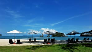 Private beach, white sand, sun-loungers, beach umbrellas